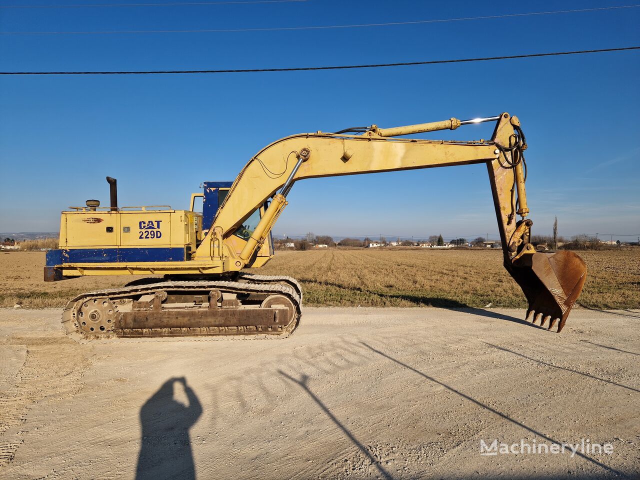 Caterpillar 229D telescopic boom excavator