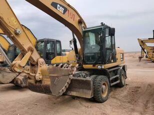 Caterpillar M320D2 wheel excavator