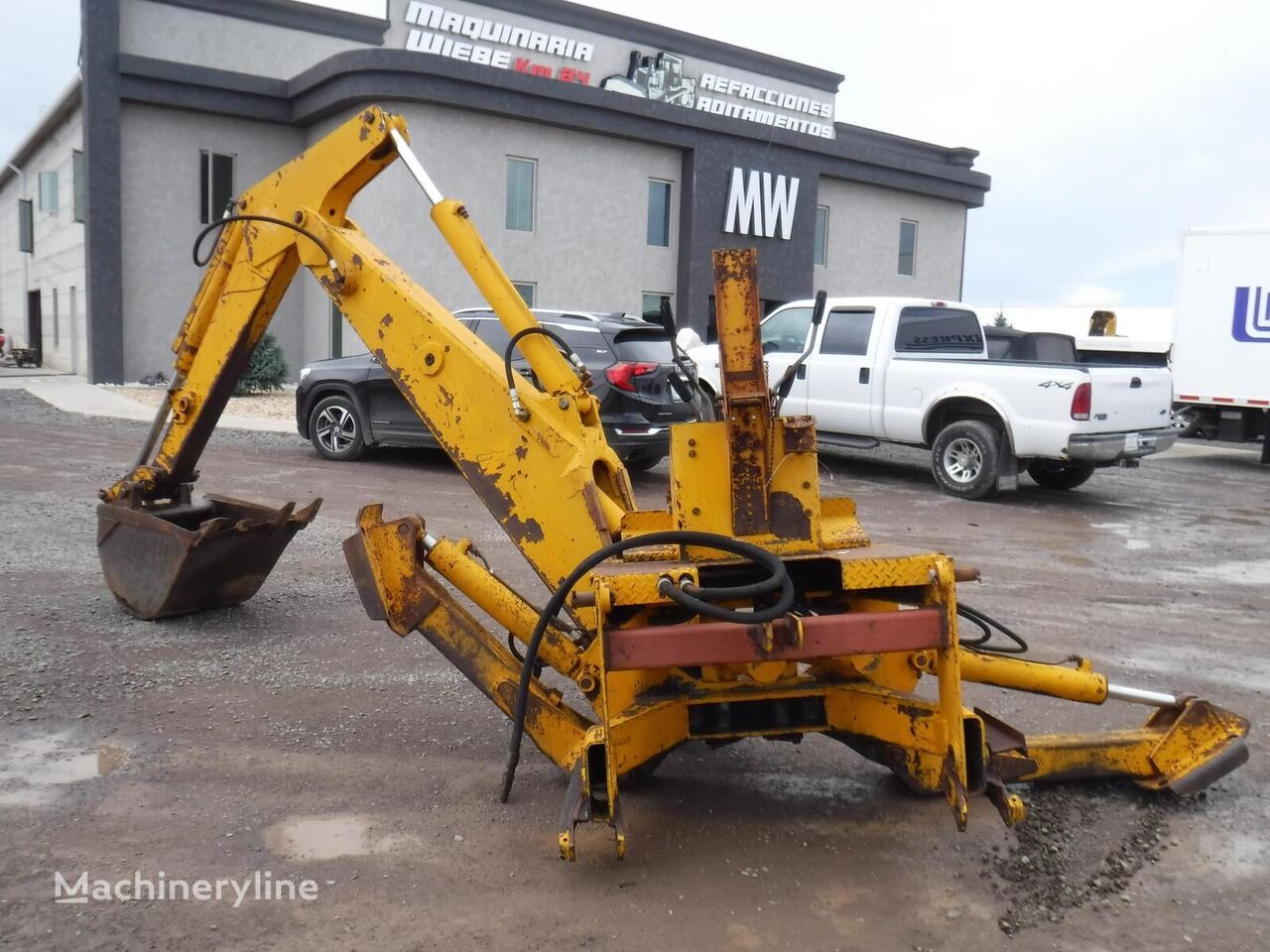 John Deere E-9400 backhoe attachment